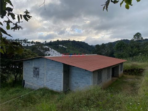 terreno con casa en obra gris en sumpango