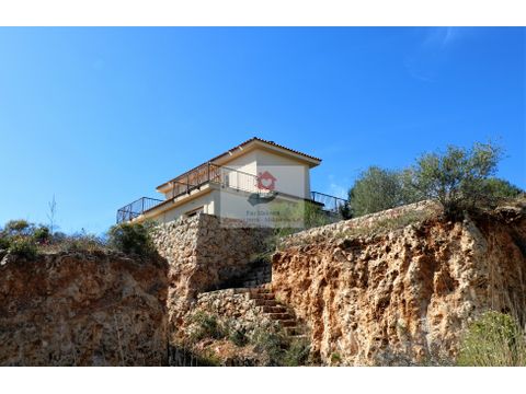 proyecto de casas en cala romantica con jardines y piscinas