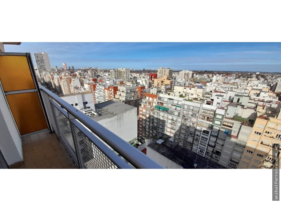 oportunidad 1 ambiente al lateral abierto con balcon saliente y vista panoramica a la ciudad en edificio de categoria maral 33