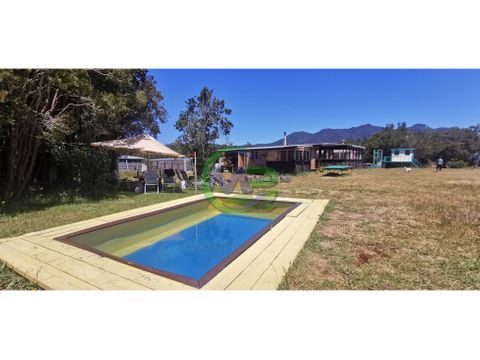 parcela 5104m2 con 2 casas tinaja piscina area de juegos